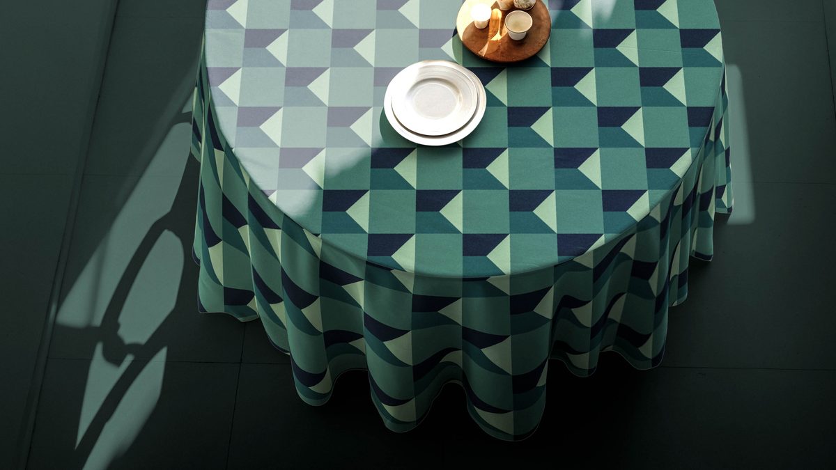 Tablecloth fabric detail in blue tones — Fabrixa reactive AOP cotton home textiles