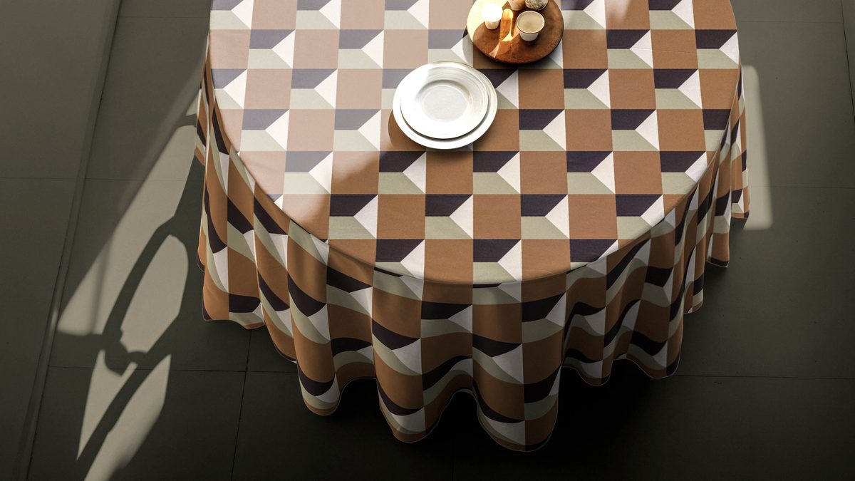 Reactive AOP detail on brown and white tablecloth — Fabrixa premium table linens